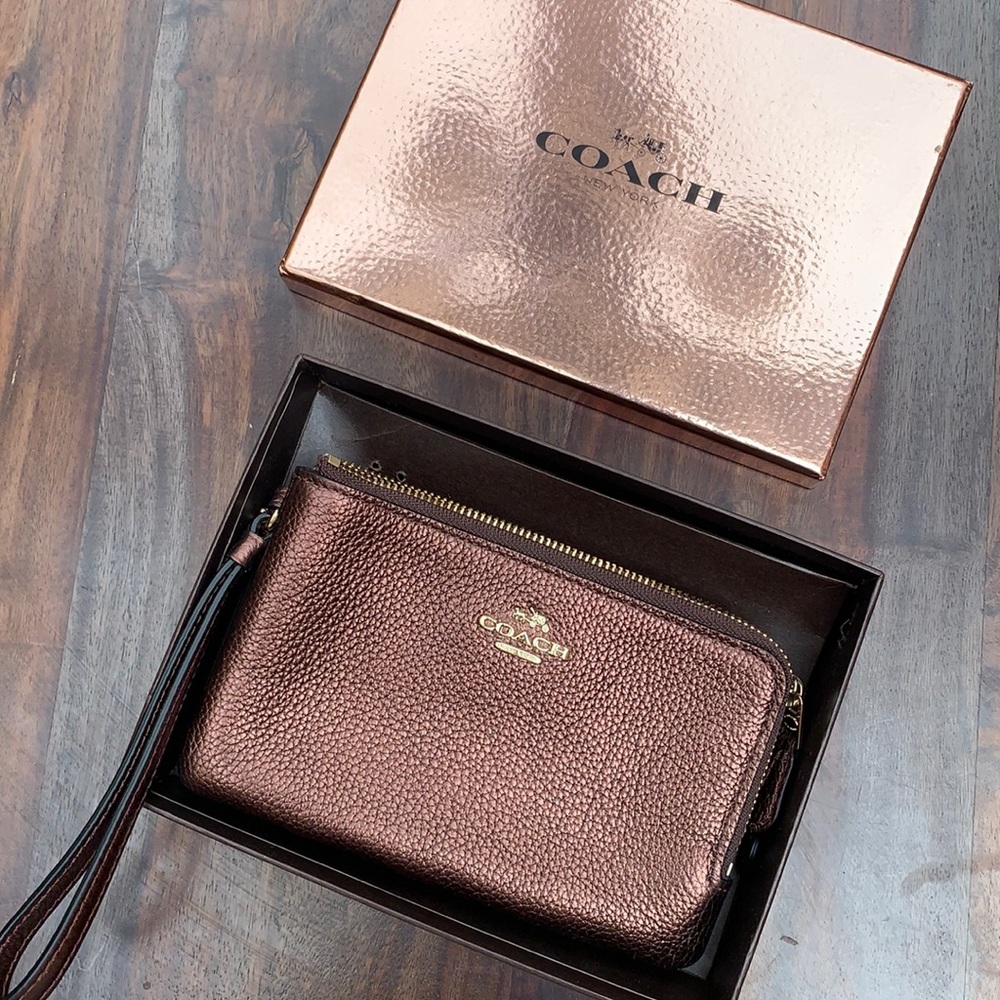 Brand new in box bronze metallic coach wristlet